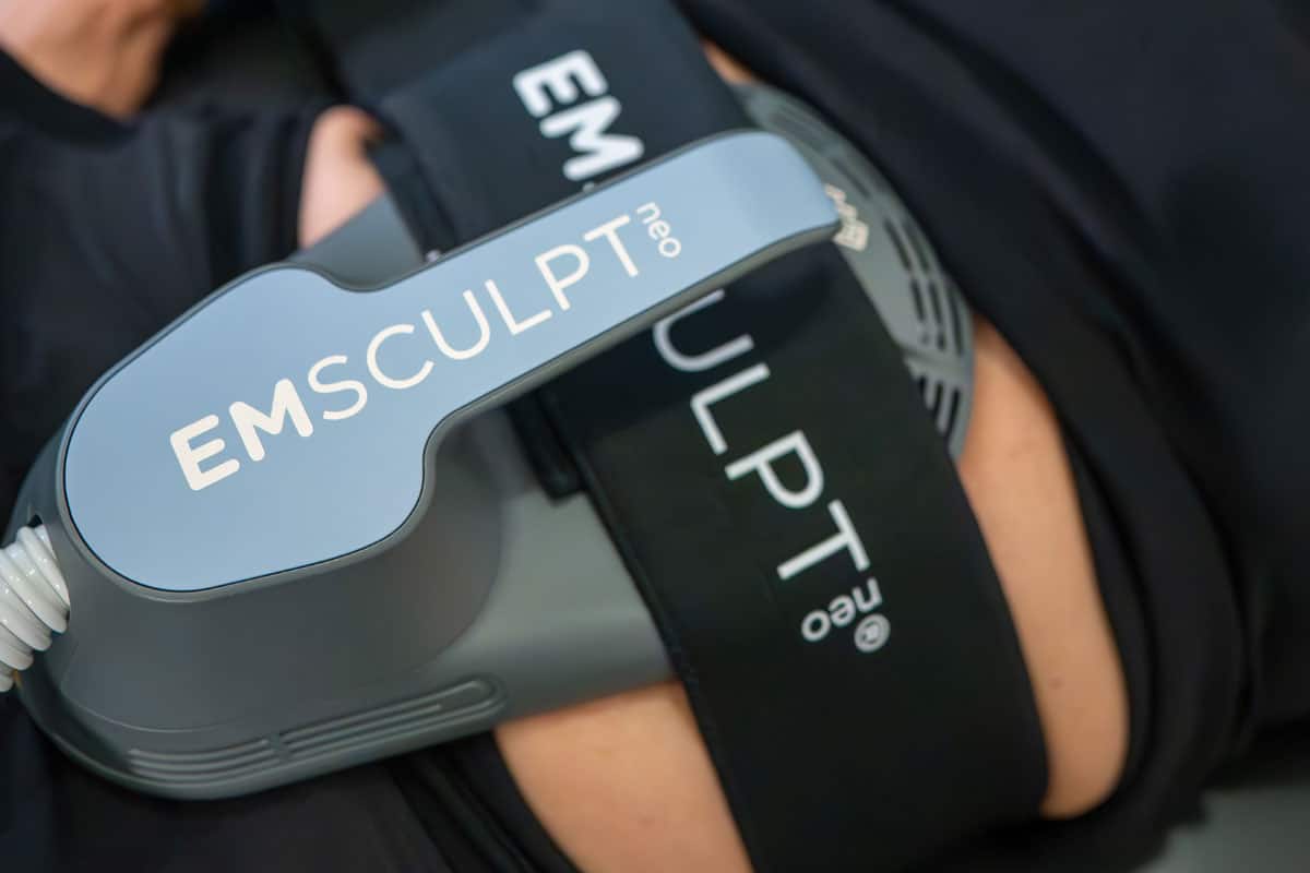 Close-up of EMSCULPT Neo applicator on abdomen during body contouring treatment at Bissell Clinic in Santa Barbara
